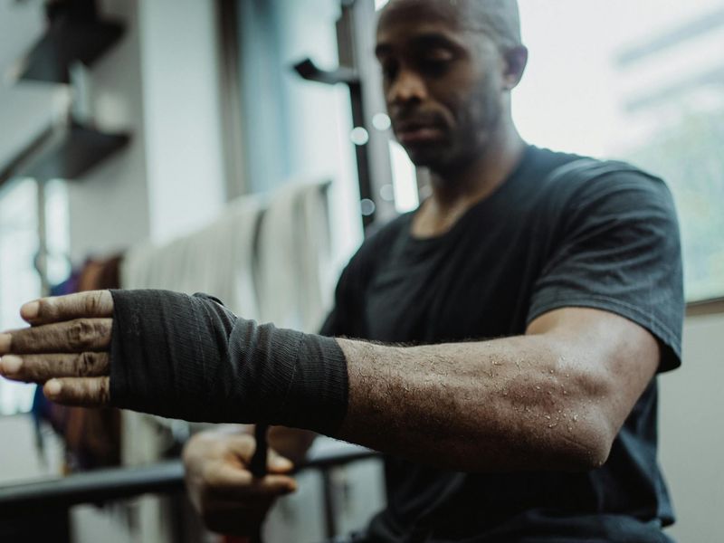 Man in a focused state preparing for an exercise.